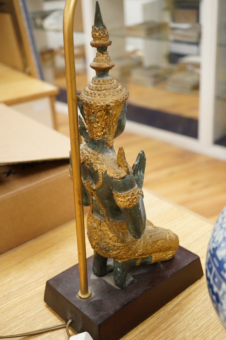 A pair of brass candlesticks and a gilt metal two branch gilt candelabrum, 45cm high
